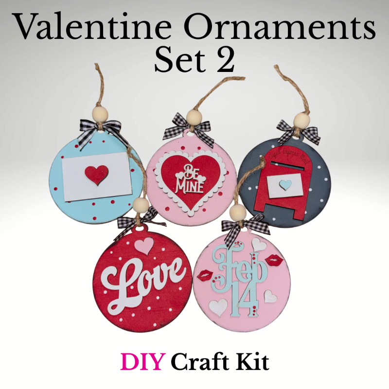 Set of Valentine-themed ornaments with decorative elements on a light gray background.