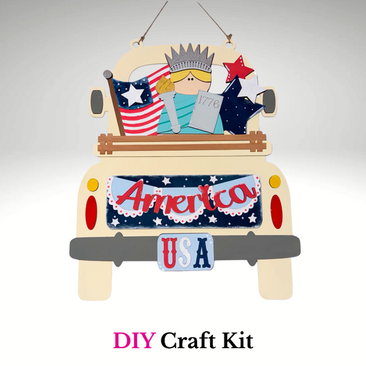 Decorative sign shaped like a truck with American-themed elements on a gray background.
