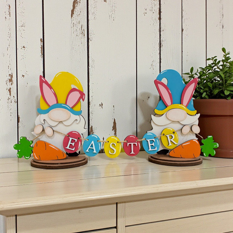 Hand-painted Easter gnome DIY craft kit with layered wooden bunny gnomes holding colorful Easter banner by Jazzi’s Creations in Orange Park Florida