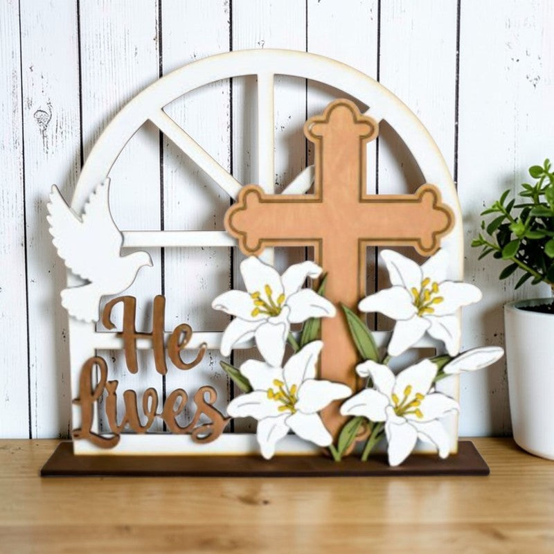 DIY He Lives Easter cross wooden craft kit with lilies and dove, unpainted Christian shelf sitter project by Jazzi's Creations.