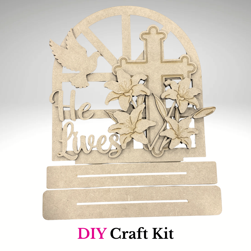 DIY He Lives Easter cross wooden craft kit with lilies and dove, unpainted Christian shelf sitter project by Jazzi's Creations in orange park fl