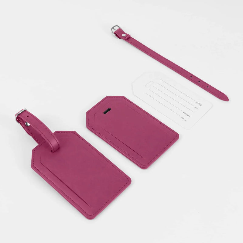 Two pink luggage tags and a matching strap at jazzis creations in orange park fl