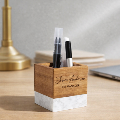 Wooden pen holder with personalized,engraved name and title on a desk at jazzis creations in orange park