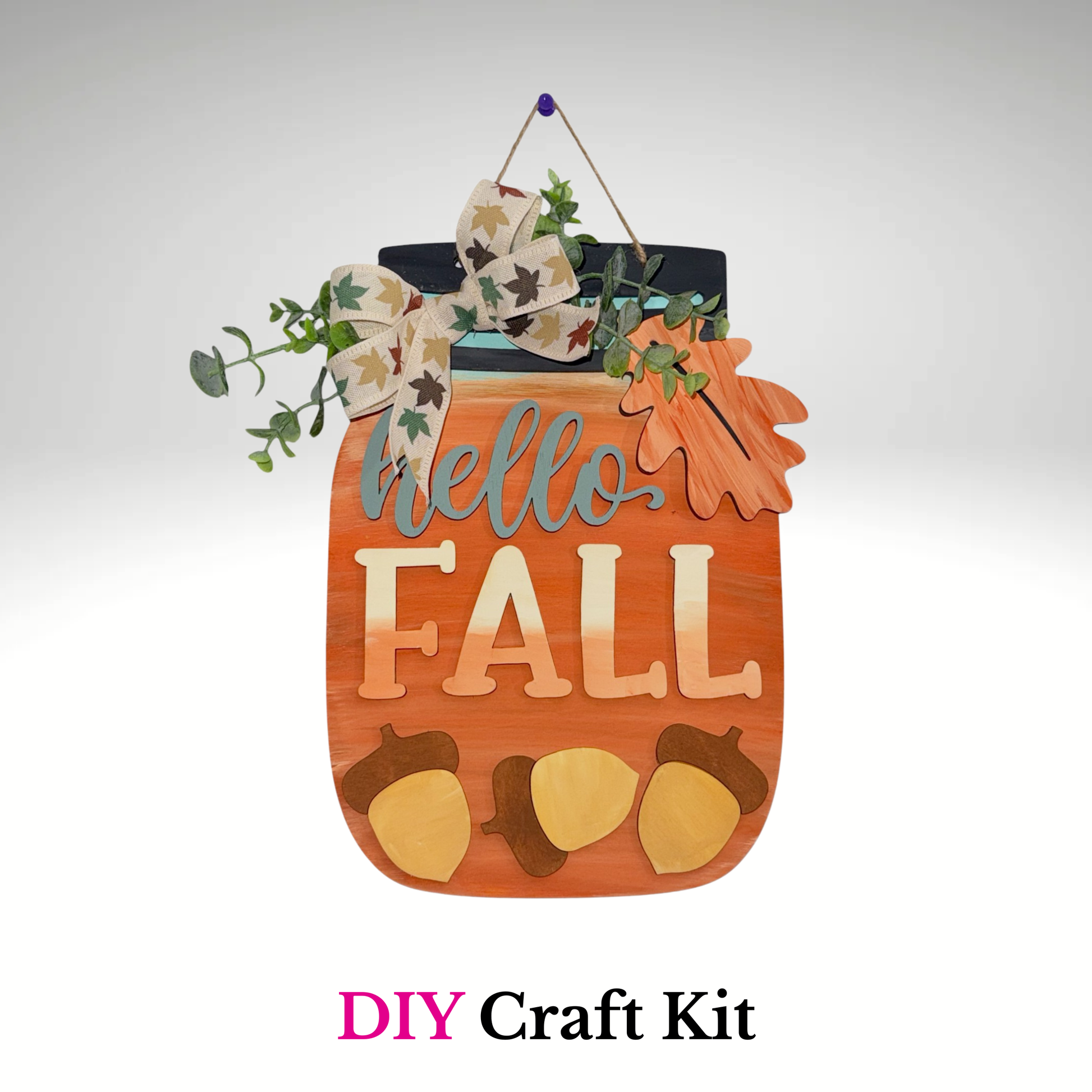 Decorative sign with 'hello FALL' text and autumn elements on a white background