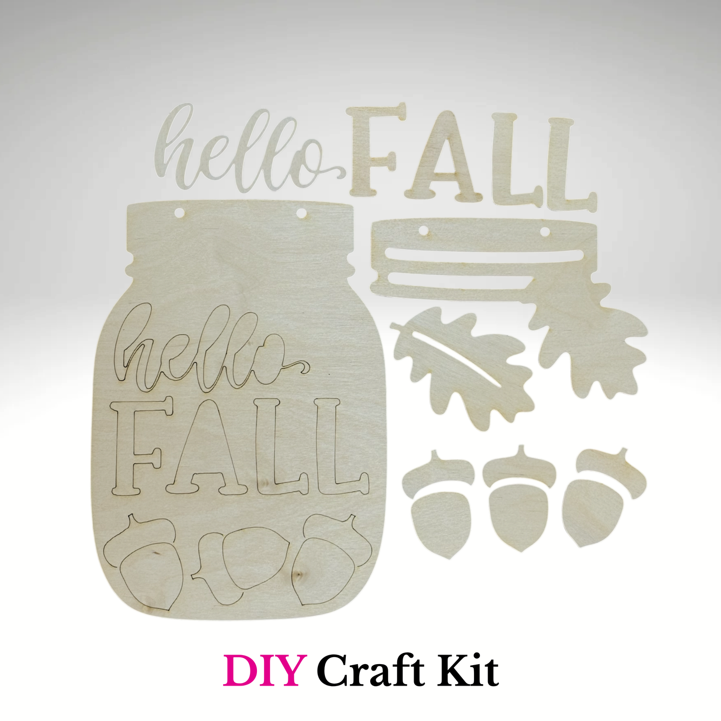 DIY craft kit with 'hello FALL' mason jar design and leaves, acorns, and pumpkins on a light gray background.