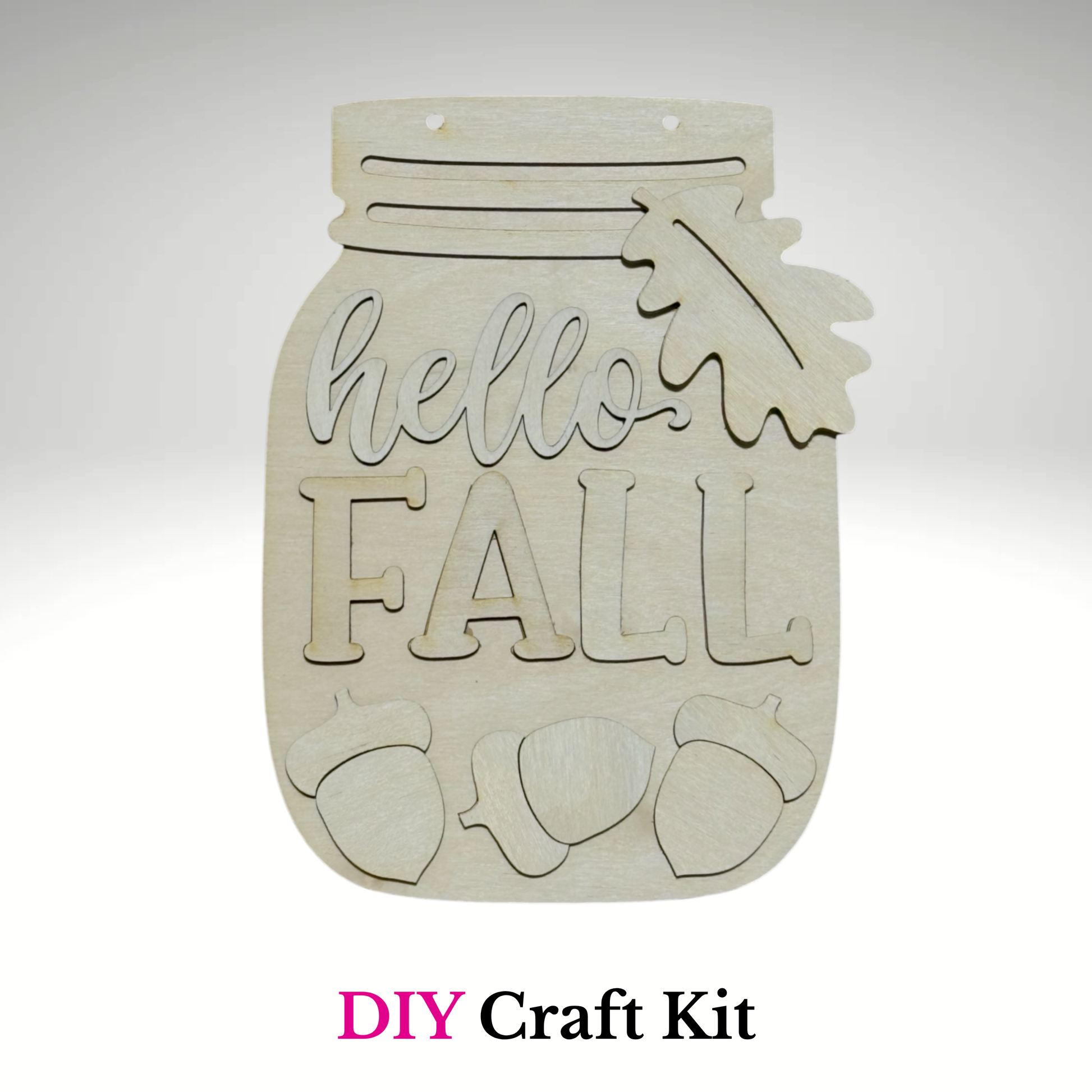 Wooden craft kit shaped like a mason jar with 'hello Fall' text on a white background