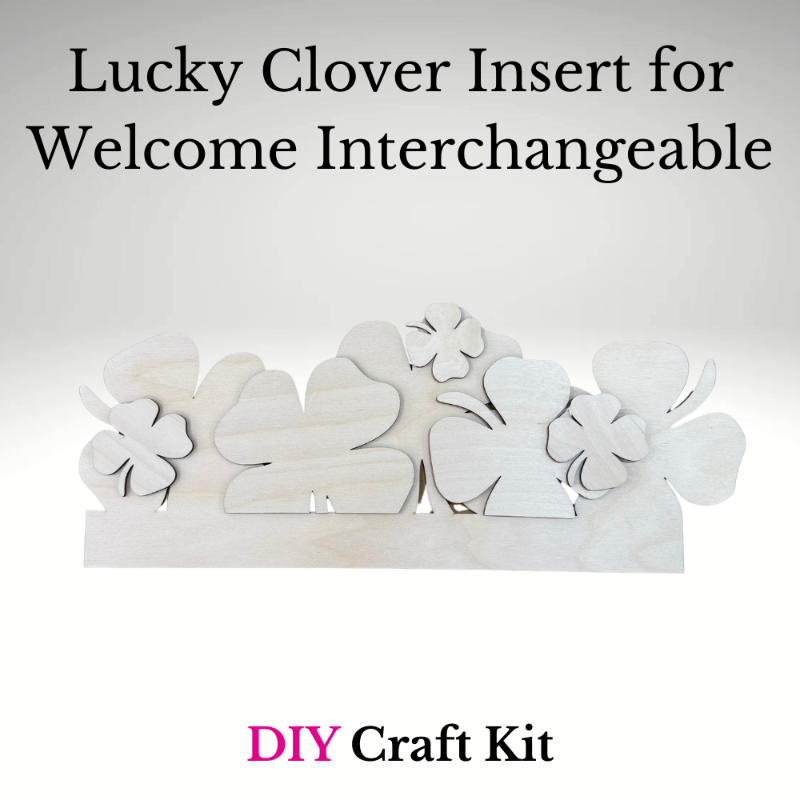 White lucky clover inserts for a welcome interchangeable DIY craft kit on a light gray background.