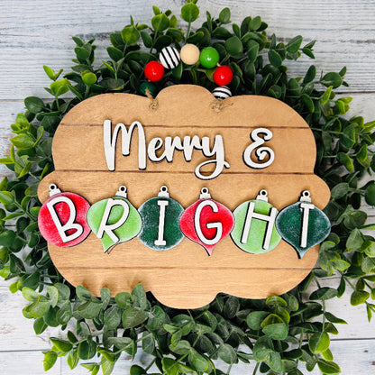 Wooden sign with 'Merry & Bright' on a green wreath at jazzis creations in orange park fl