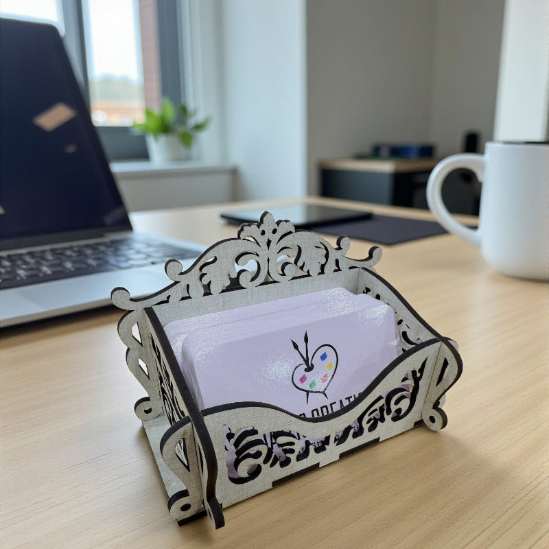 Decorative card holder with cards on a desk next to a laptop and mug at jazzis creations in orange park fl