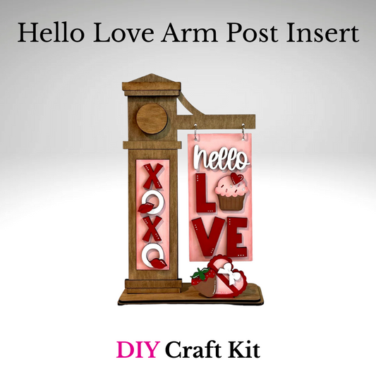 Valentine XO interchangeable arm post insert featuring pink and red wood letters, a Hello Love sign, cupcake accent, and heart-shaped chocolate decor on a wooden arm post stand.