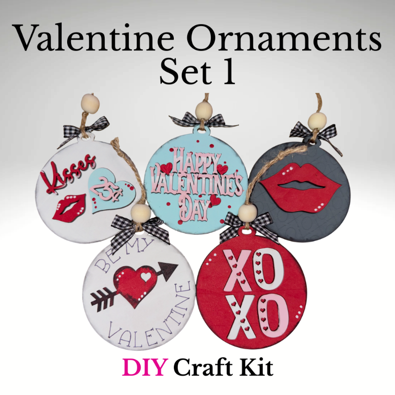 Set of Valentine-themed ornaments with decorative text and designs on a white background.